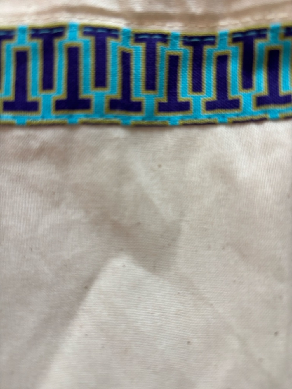 Tory Burch dust bag with the traditional T going across the top of the bag - Picture 2 of 3